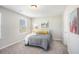 Comfortable bedroom with gray bedding and large window at 115 Headwater Dr, Summerville, SC 29486