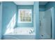 Spa-like bathroom with a large tub and walk-in shower at 1295 Island Club Dr # E, Charleston, SC 29492