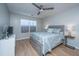 Bright bedroom with ceiling fan and coastal bedding at 1295 Island Club Dr # E, Charleston, SC 29492