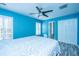 Primary bedroom with white double doors leading to the bathroom at 1295 Island Club Dr # E, Charleston, SC 29492