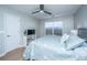 Bedroom with ceiling fan, wood floors, and white door at 1295 Island Club Dr # E, Charleston, SC 29492