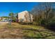 Tan house with small yard and trees at 1295 Island Club Dr # E, Charleston, SC 29492