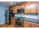 Stainless steel appliances and updated wood cabinets at 1295 Island Club Dr # E, Charleston, SC 29492