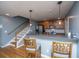 Kitchen with wood cabinets, bar seating, and gray countertops at 1295 Island Club Dr # E, Charleston, SC 29492