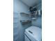 Laundry room with washer, dryer, and ample shelving at 1295 Island Club Dr # E, Charleston, SC 29492