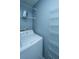Efficient laundry room with shelving and a washer at 1295 Island Club Dr # E, Charleston, SC 29492