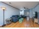 Living room with hardwood floors, blue sectional sofa, and a ceiling fan at 1295 Island Club Dr # E, Charleston, SC 29492