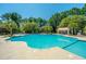 Community pool with plenty of lounge chairs and a shaded area at 1295 Island Club Dr # E, Charleston, SC 29492