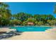 Community pool with lounge chairs and cabana at 1295 Island Club Dr # E, Charleston, SC 29492