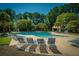 Community pool with plenty of lounge chairs at 1295 Island Club Dr # E, Charleston, SC 29492