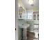 Clean bathroom with pedestal sink and light green walls at 1321 Erckmann Dr, Mount Pleasant, SC 29464
