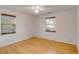 Simple bedroom with hardwood floors and two windows at 1321 Erckmann Dr, Mount Pleasant, SC 29464