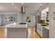 White kitchen with marble countertops and gas range at 1321 Erckmann Dr, Mount Pleasant, SC 29464