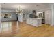 Open concept kitchen with island and hardwood floors at 1321 Erckmann Dr, Mount Pleasant, SC 29464
