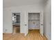 Laundry room with built-in cabinets and hardwood floors at 1321 Erckmann Dr, Mount Pleasant, SC 29464