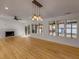 Bright living room with hardwood floors, fireplace, and sliding glass doors at 1321 Erckmann Dr, Mount Pleasant, SC 29464