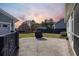 Spacious backyard with patio, grill, and fenced area at 176 Callibluff Dr, Summerville, SC 29486