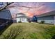 Fenced backyard with green lawn and home view at 176 Callibluff Dr, Summerville, SC 29486