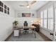 Bright home office with wood desk and window shutters at 176 Callibluff Dr, Summerville, SC 29486