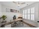 Bright home office with wood desk and window shutters at 176 Callibluff Dr, Summerville, SC 29486