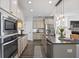 Modern kitchen with island and stainless steel appliances at 176 Callibluff Dr, Summerville, SC 29486