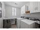 Laundry room with washer, dryer, and extra storage at 176 Callibluff Dr, Summerville, SC 29486