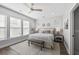 Bright and spacious main bedroom with large windows and wood flooring at 176 Callibluff Dr, Summerville, SC 29486
