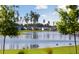 Scenic community lake with homes and lush landscaping at 185 Belfort Pl, Summerville, SC 29486