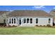 Home's exterior back view, showcasing a spacious backyard at 192 Collared Dove Ct, Summerville, SC 29483