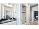 Clean bathroom with a tub shower combo and dark vanity at 192 Collared Dove Ct, Summerville, SC 29483