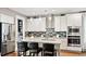 Modern kitchen with island, granite counters, and stainless steel appliances at 192 Collared Dove Ct, Summerville, SC 29483