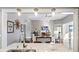 Open concept kitchen with island, granite counters and living room view at 192 Collared Dove Ct, Summerville, SC 29483