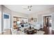 Open living room with hardwood floors and white couch at 192 Collared Dove Ct, Summerville, SC 29483