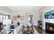Spacious living room with a fireplace and large windows at 192 Collared Dove Ct, Summerville, SC 29483