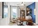 Nautical-themed home office with built-in shelving and large windows at 192 Collared Dove Ct, Summerville, SC 29483