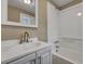 Clean bathroom with white vanity, bathtub, and shower at 1984 Hugo Ave, North Charleston, SC 29405