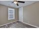 Charming bedroom with grey flooring and a ceiling fan at 1984 Hugo Ave, North Charleston, SC 29405