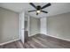 Spacious bedroom with ceiling fan and access to another room at 1984 Hugo Ave, North Charleston, SC 29405