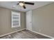 Cozy bedroom featuring a ceiling fan and large window at 1984 Hugo Ave, North Charleston, SC 29405