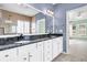 Elegant bathroom with granite countertops, double sinks, and a large mirror at 199 Schooner Bend Ave, Summerville, SC 29486