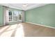 Bright bedroom with light green walls and hardwood floors at 199 Schooner Bend Ave, Summerville, SC 29486