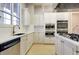 Bright community kitchen with stainless steel appliances and white cabinets at 199 Schooner Bend Ave, Summerville, SC 29486