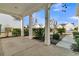 Covered front porch with white columns and view of neighborhood at 199 Schooner Bend Ave, Summerville, SC 29486