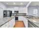 Modern kitchen with granite countertops and stainless steel appliances at 199 Schooner Bend Ave, Summerville, SC 29486