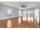 Sunlit living room with hardwood floors and access to patio at 199 Schooner Bend Ave, Summerville, SC 29486