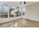 Sunroom with multiple windows, carpet flooring, and exterior access at 199 Schooner Bend Ave, Summerville, SC 29486