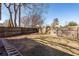 Fenced backyard with mature trees, providing shade and privacy at 208 Buckskin Dr, Summerville, SC 29486