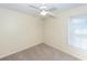 Simple bedroom with ceiling fan and neutral wall paint at 208 Buckskin Dr, Summerville, SC 29486