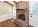 Brick fireplace with a wood mantel in the living room at 208 Buckskin Dr, Summerville, SC 29486