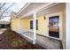 Inviting front porch with white railings and a glass front door at 208 Buckskin Dr, Summerville, SC 29486